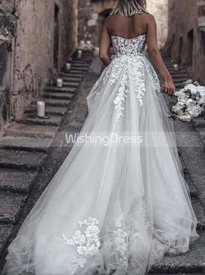 Lace applique see thru bodice wedding gown.